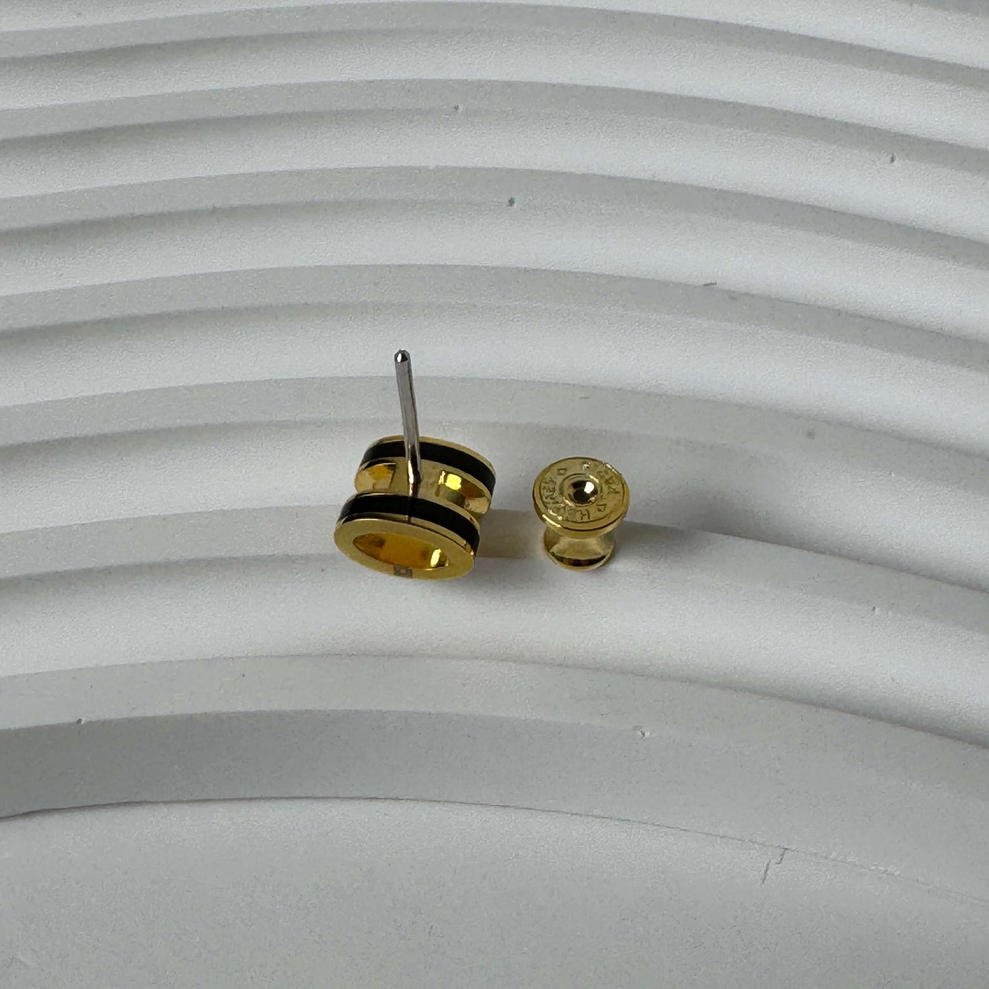 H stud earrings side view