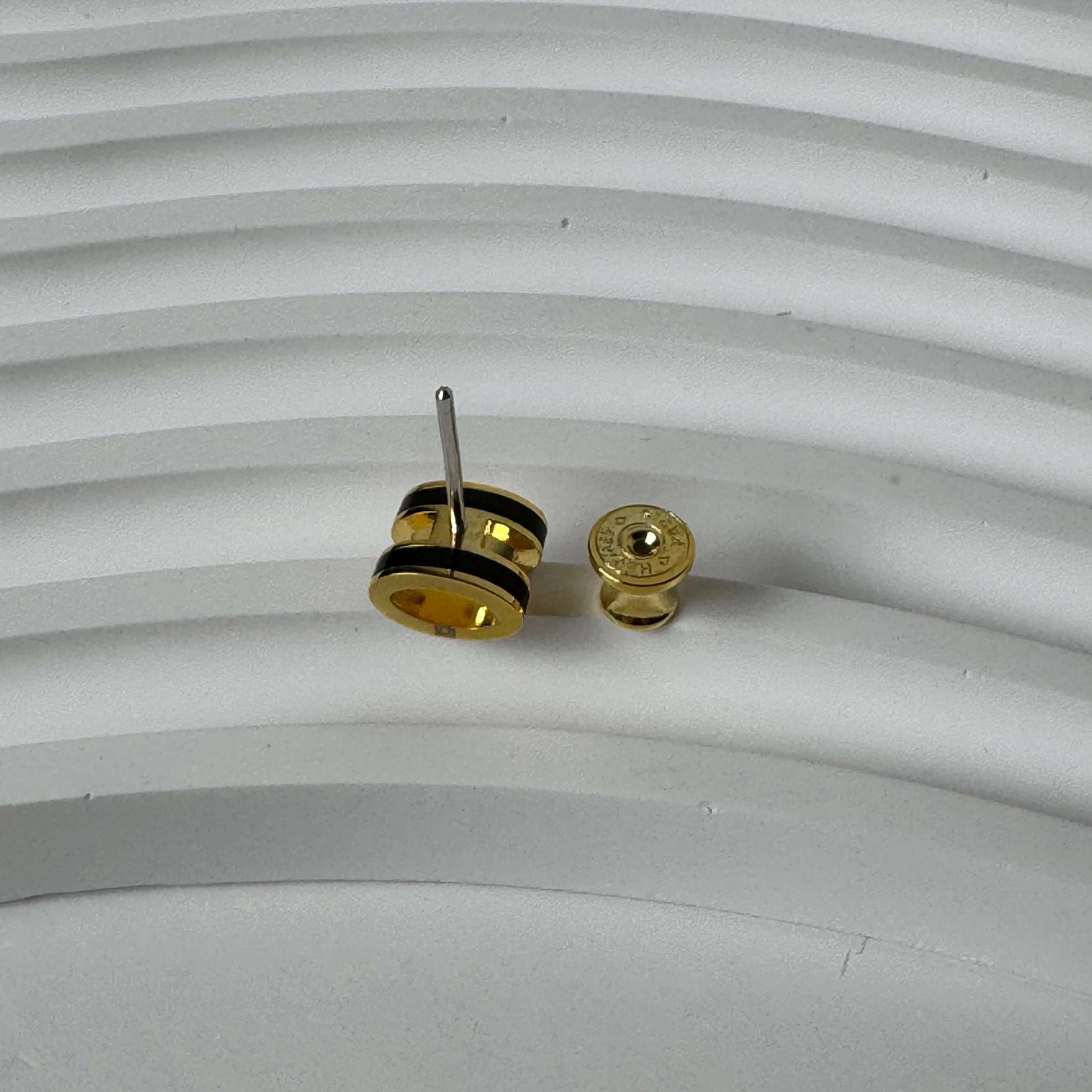 H stud earrings side view