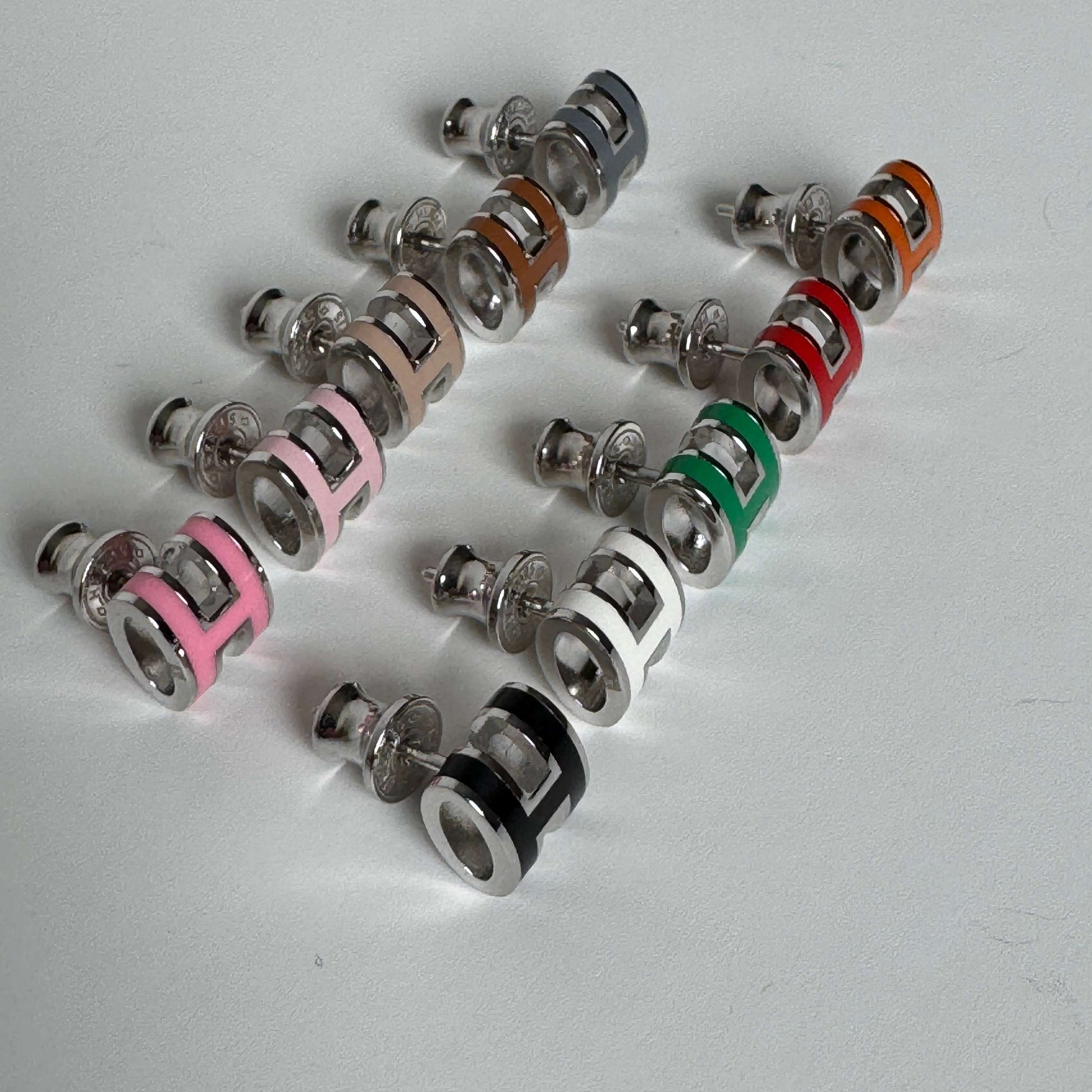 White gold enamel H stud earrings in multiple colors