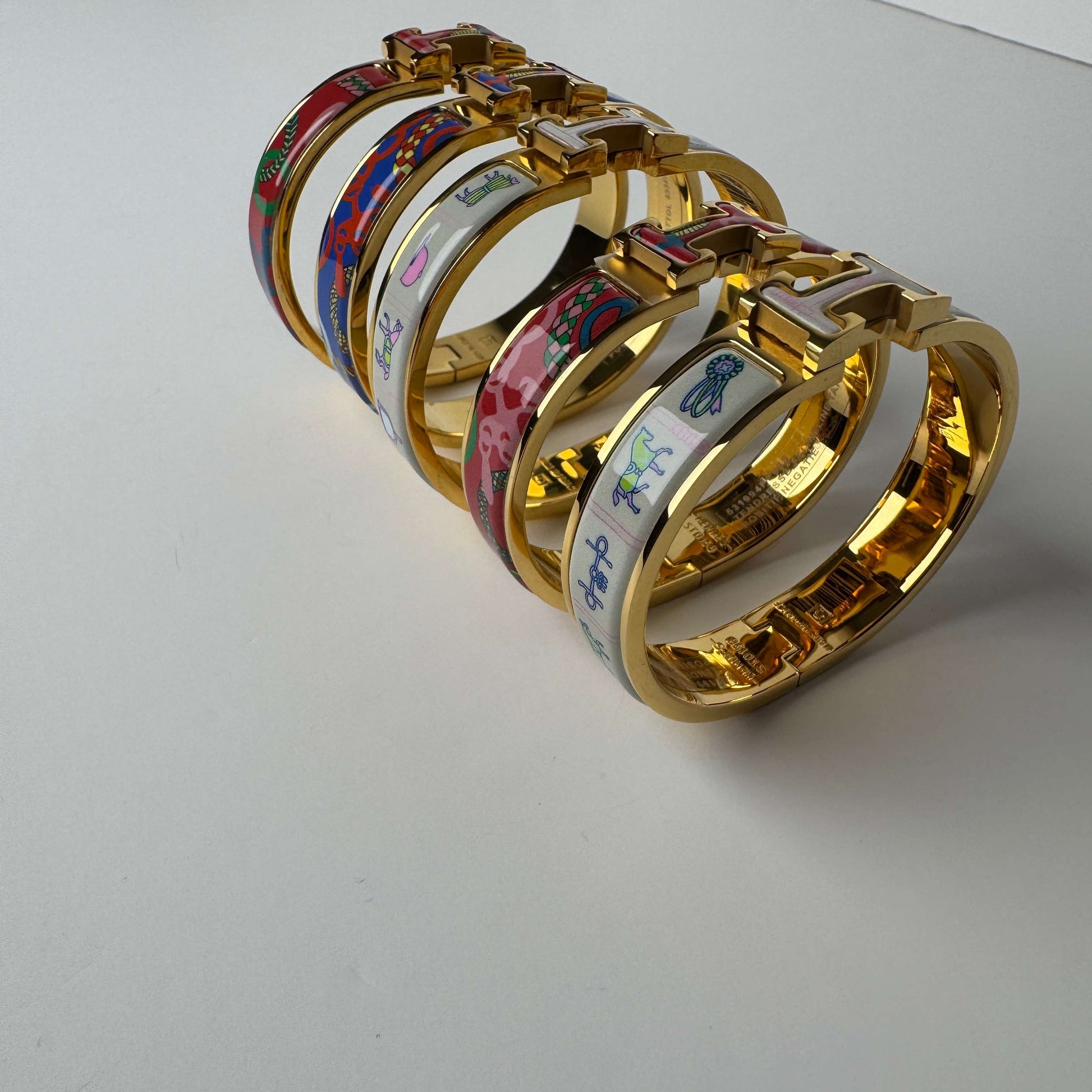 Yellow gold printed enamel H bangles front vi