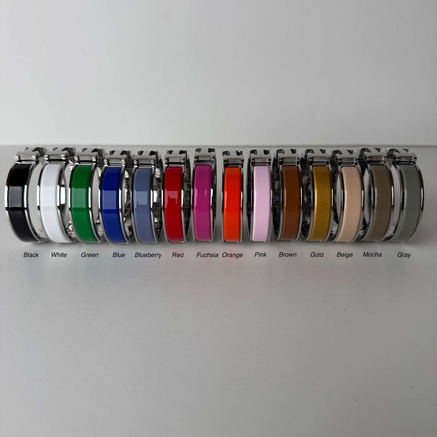 White gold enamel H bangles side view in multiple colors